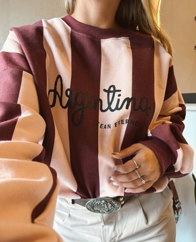 BUZO SEAN ETERNOS FUCSIA Y ROSA