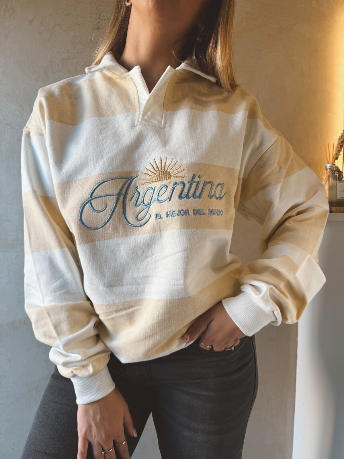 BUZO ARGENTINA PROMO NEGRO MARRÓN AMARILLO